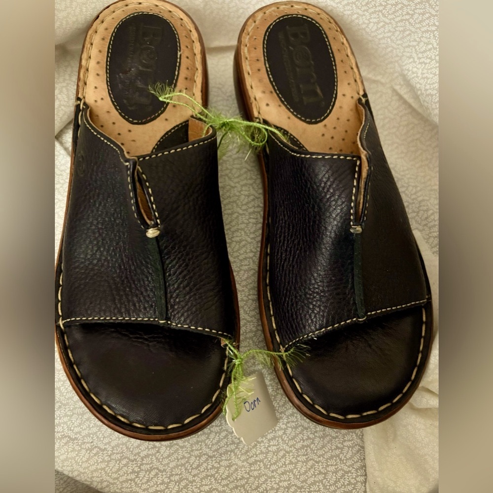 Born Brand Black Slides in very good preowned condition.
